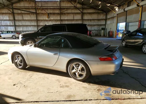 1999 Porsche 911 Carrera z USA, uszkodzony, nr VIN WP0CA2996XS654474